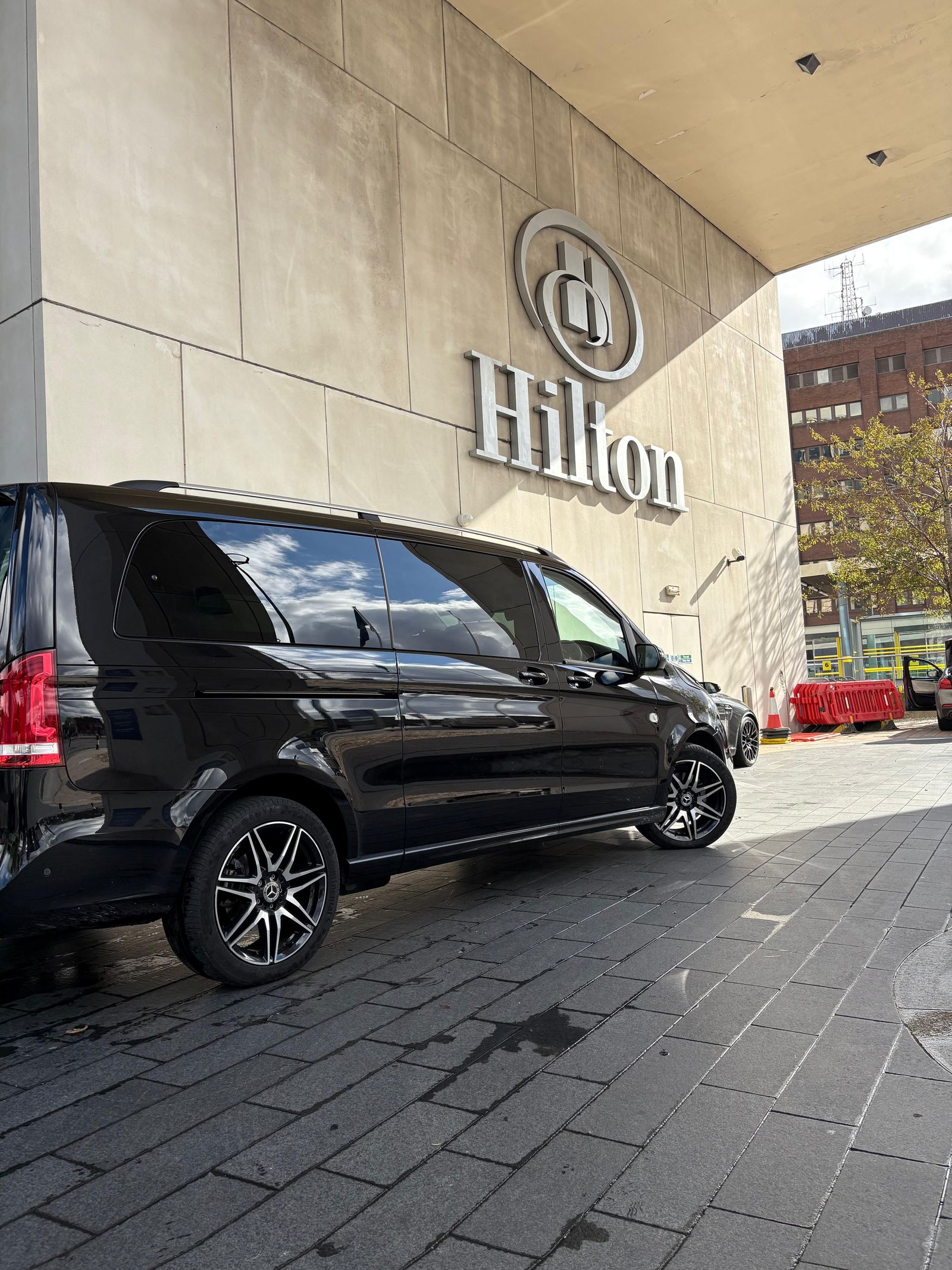 AO Platinum Chauffeurs V-Class outside the Hilton Liverpool hotel